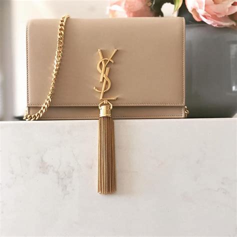 ysl kate with tassel|YSL evening bag with tassel.